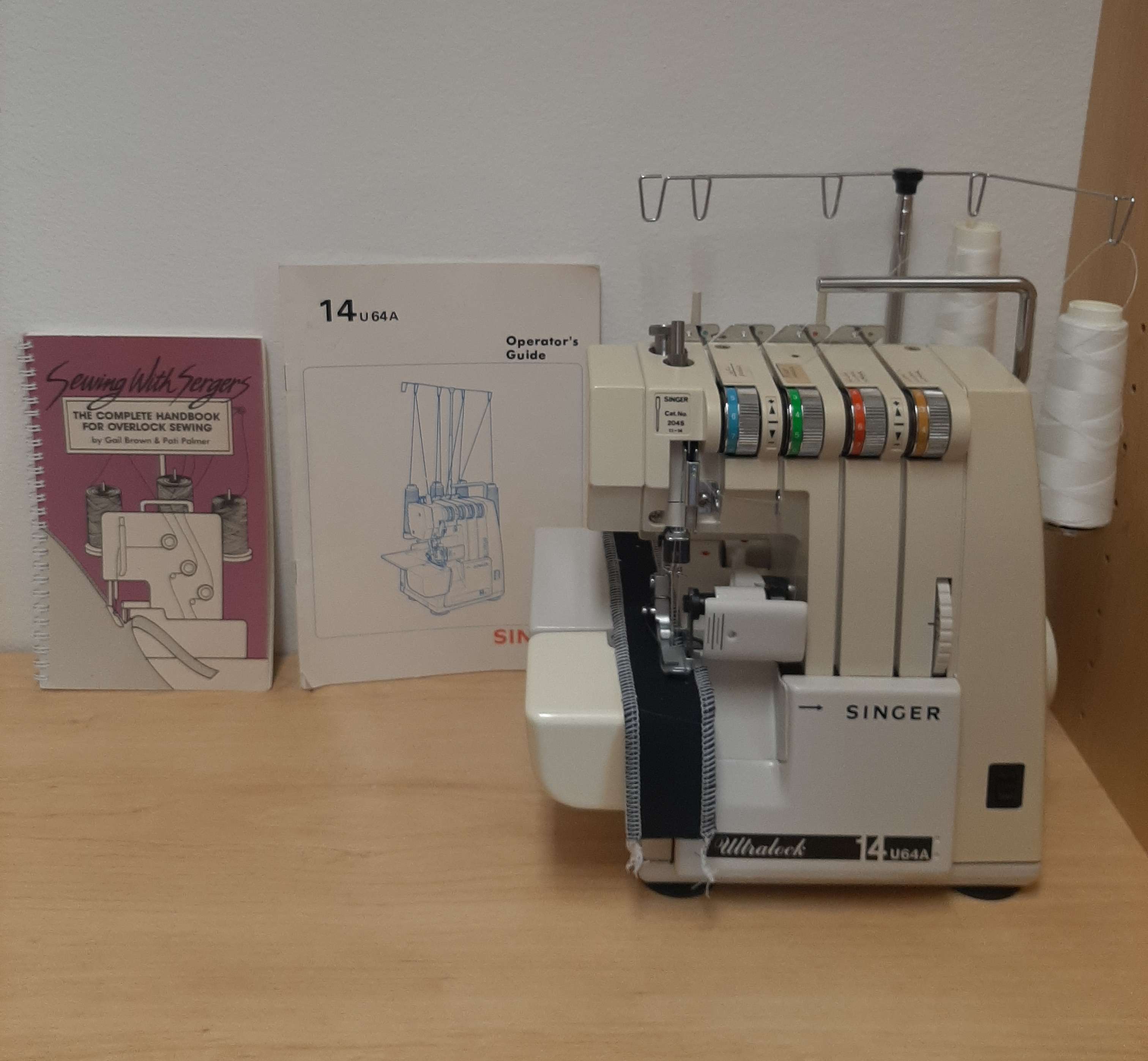 Is anyone familiar with this serger model? Singer Ultralock Model 14U34B :  r/sewing