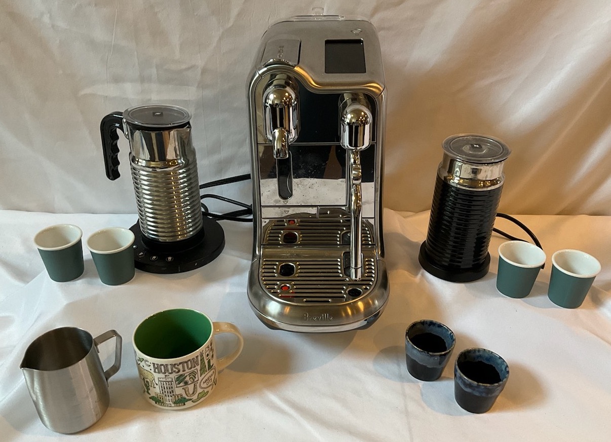 Sold at Auction: A DeLonghi Nespresso Coffee Machine & Milk