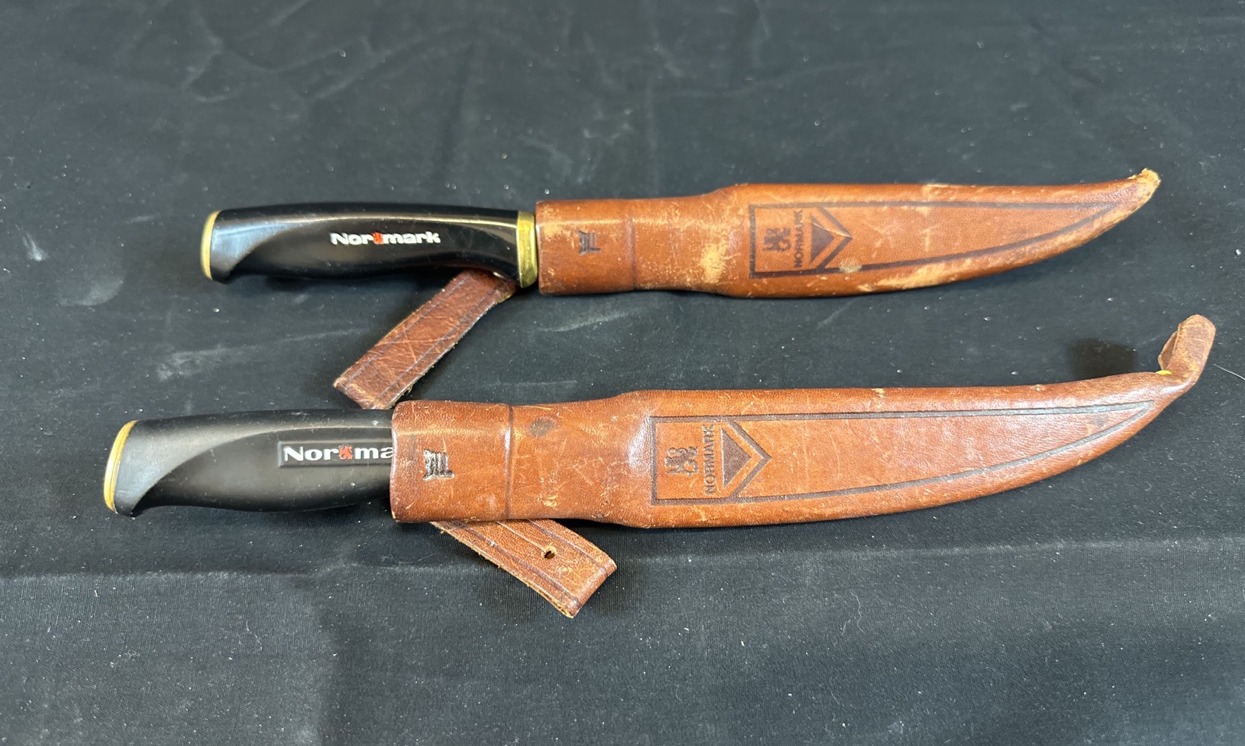 Normark fillet knife with leather sheath Auction