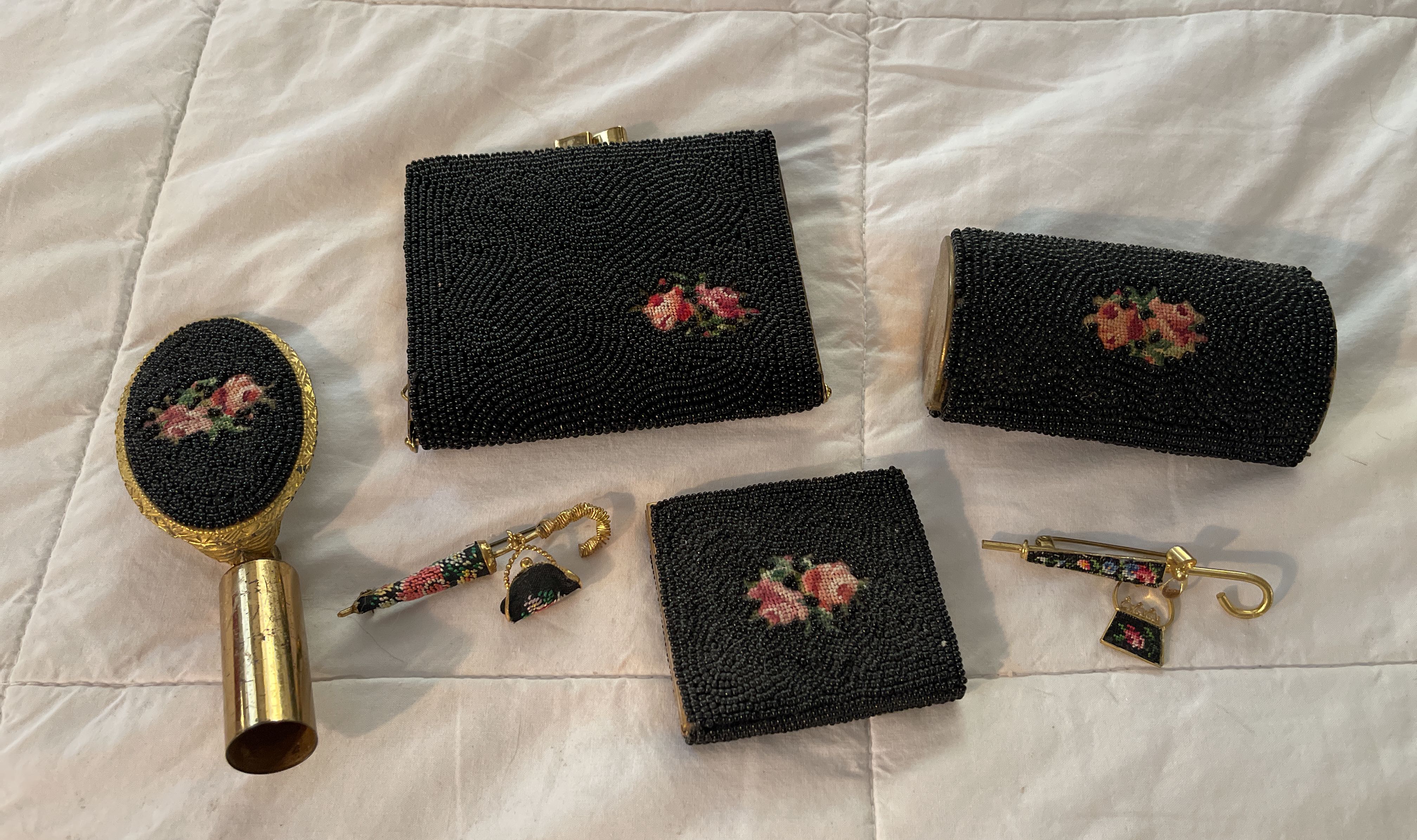 Lot - Lot of six vintage purses. Includes a Whting & Davis cream color  enamel bag, a lovely silk and pastel colored clutch which was made in  France, a small beaded purse
