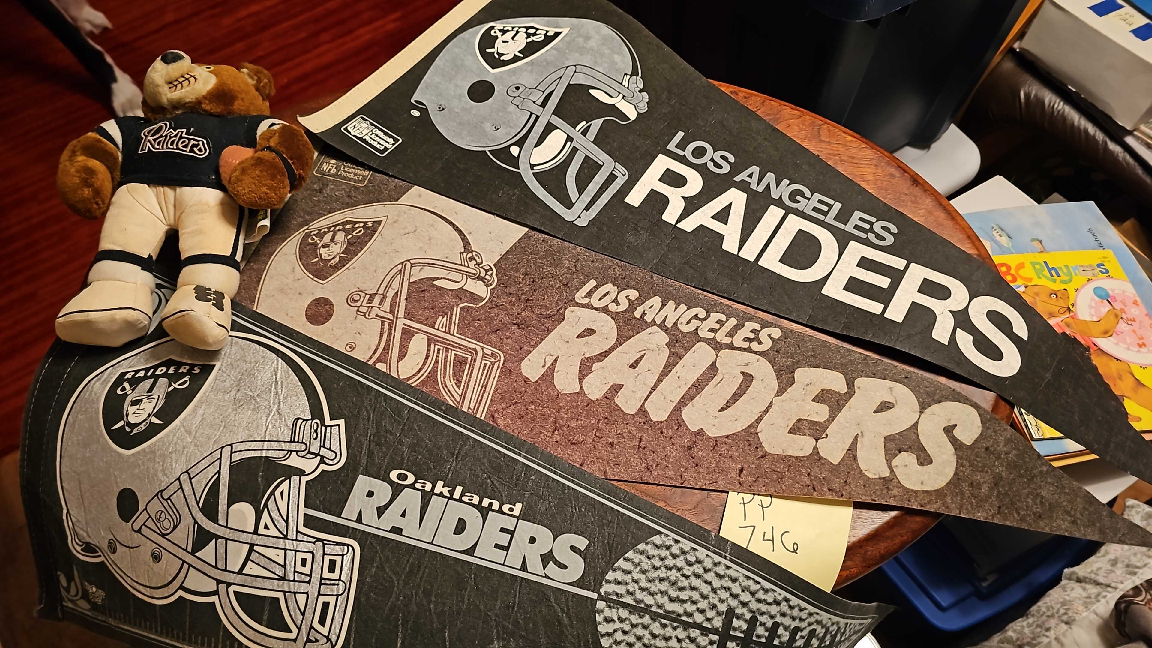 Los Angeles Raiders & Oakland Raiders Pennants And Vintage Plush Toy.