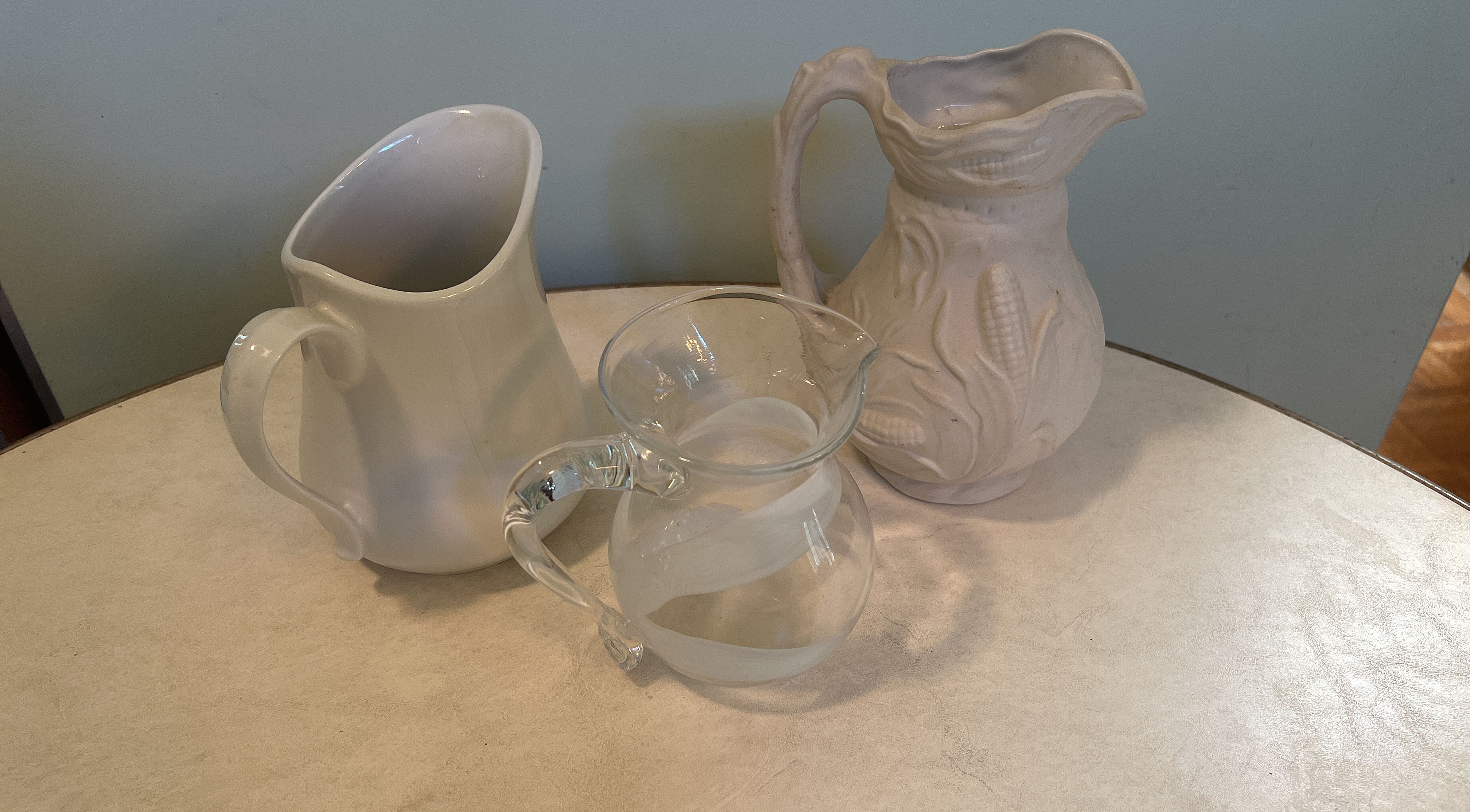 Sold at Auction: Three Art Glass Water Pitchers