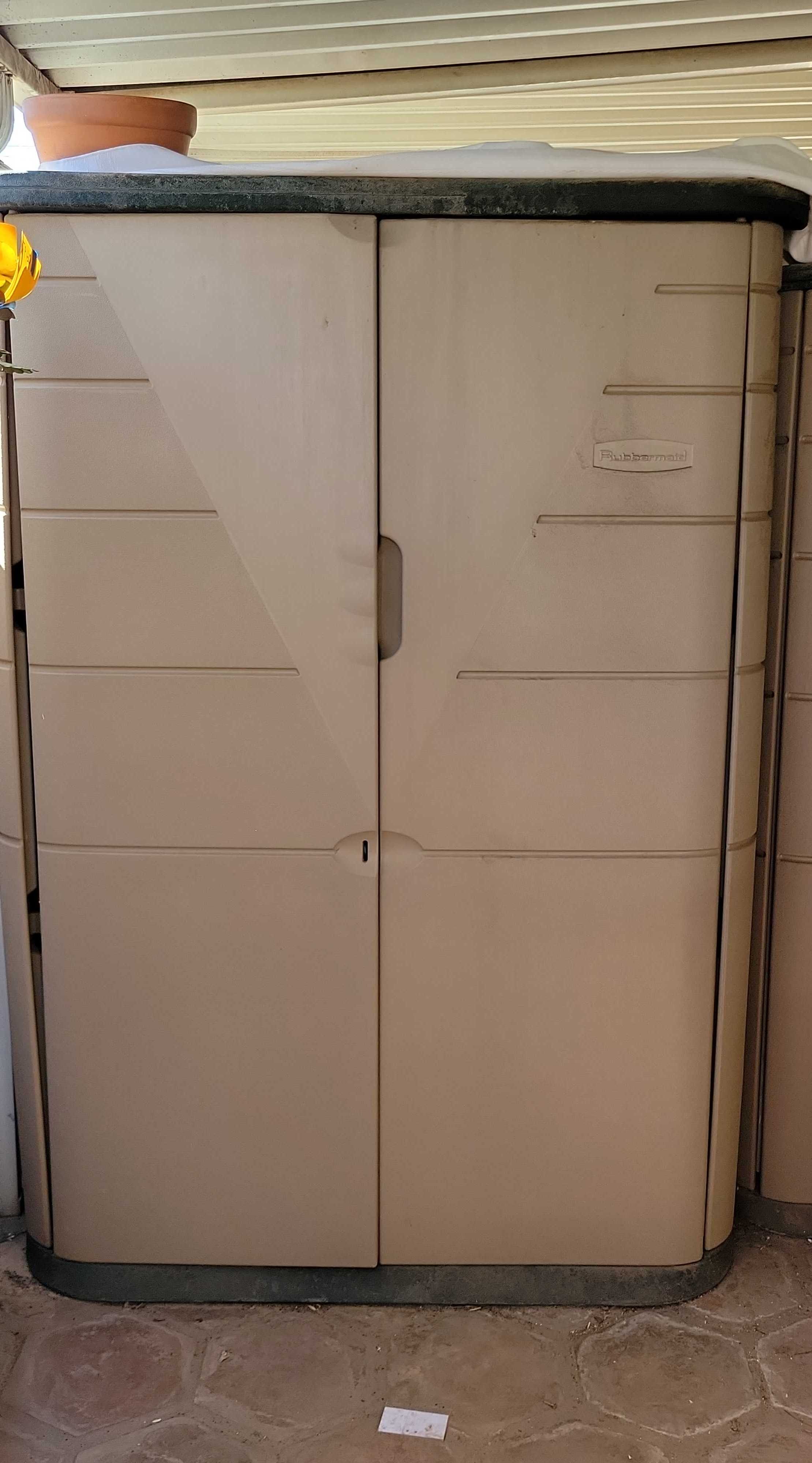 Sold at Auction: rubbermaid storage cabinet