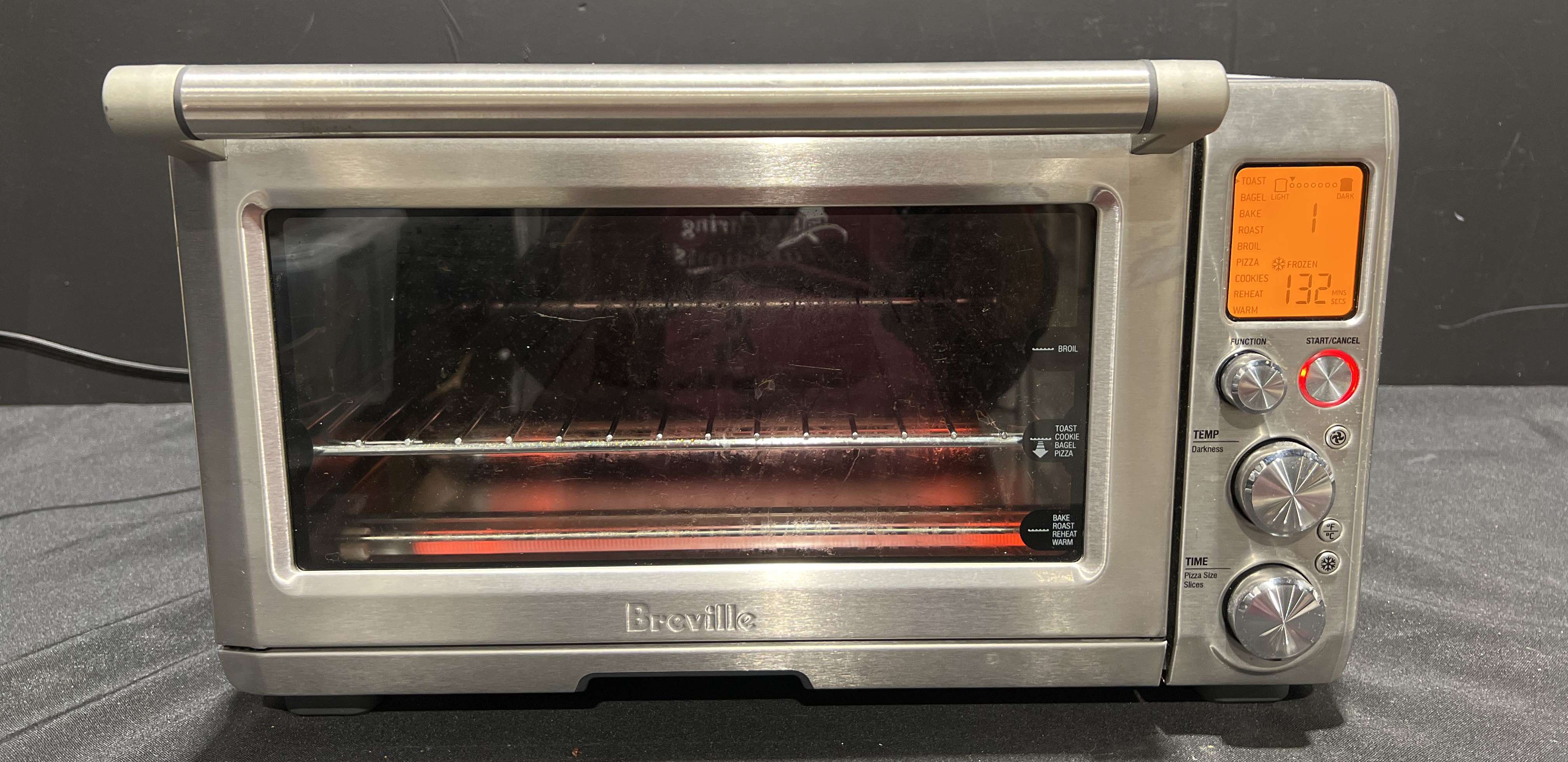 Sold at Auction: Powered on Breville mini smart oven