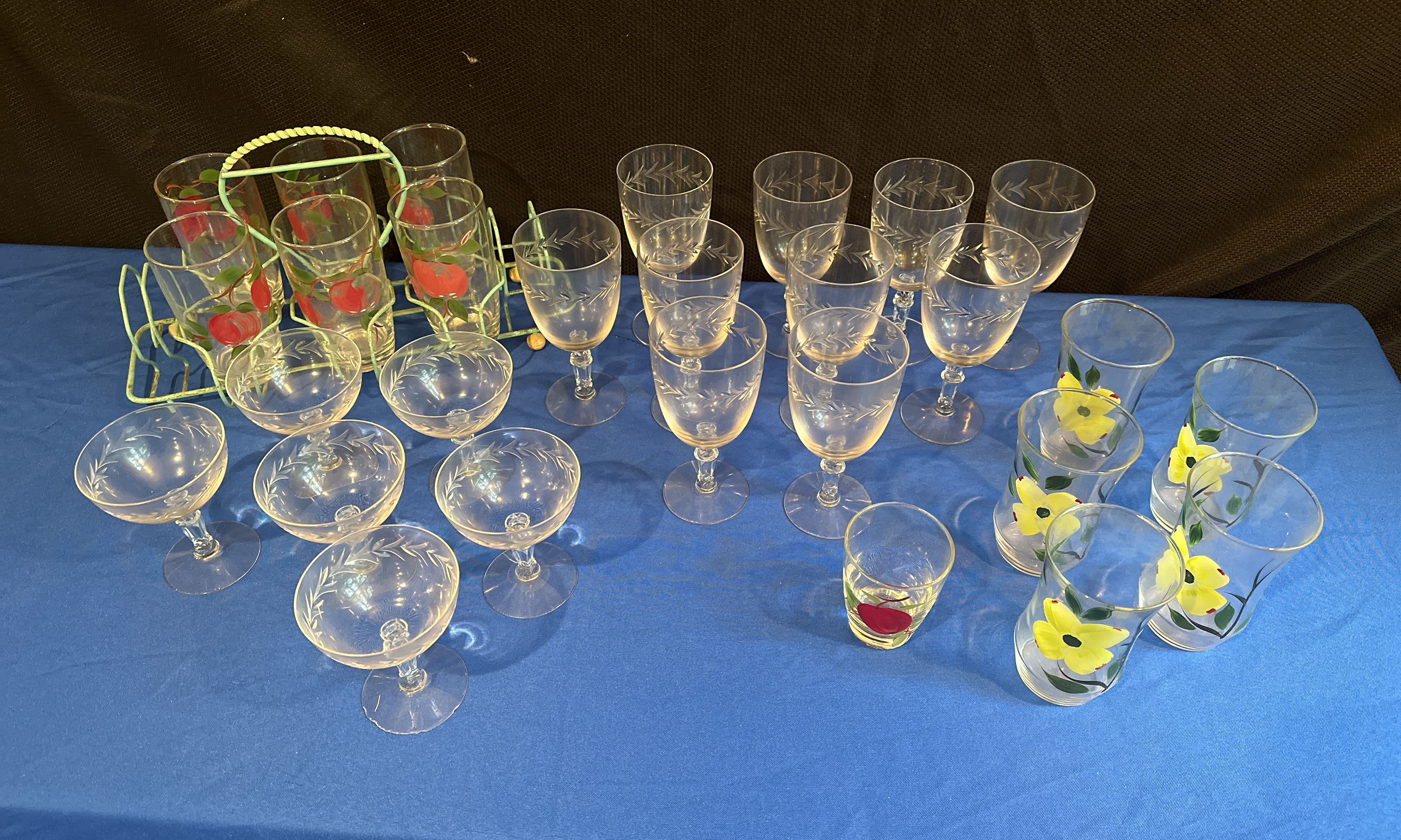 Sold at Auction: A set of five square bottom stemmed wine glasses