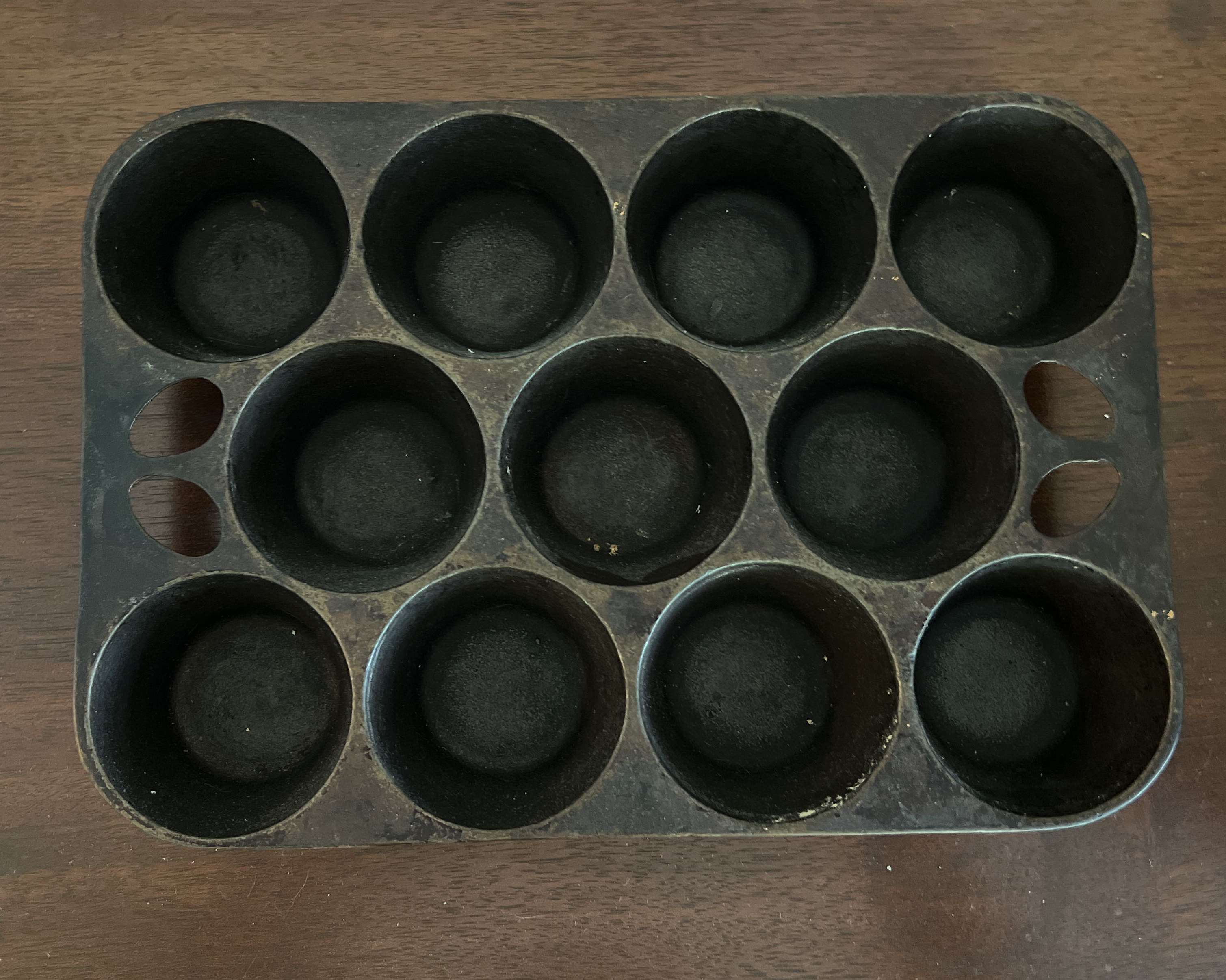 At Auction: G.F. Filley cast iron No.12 muffin pan