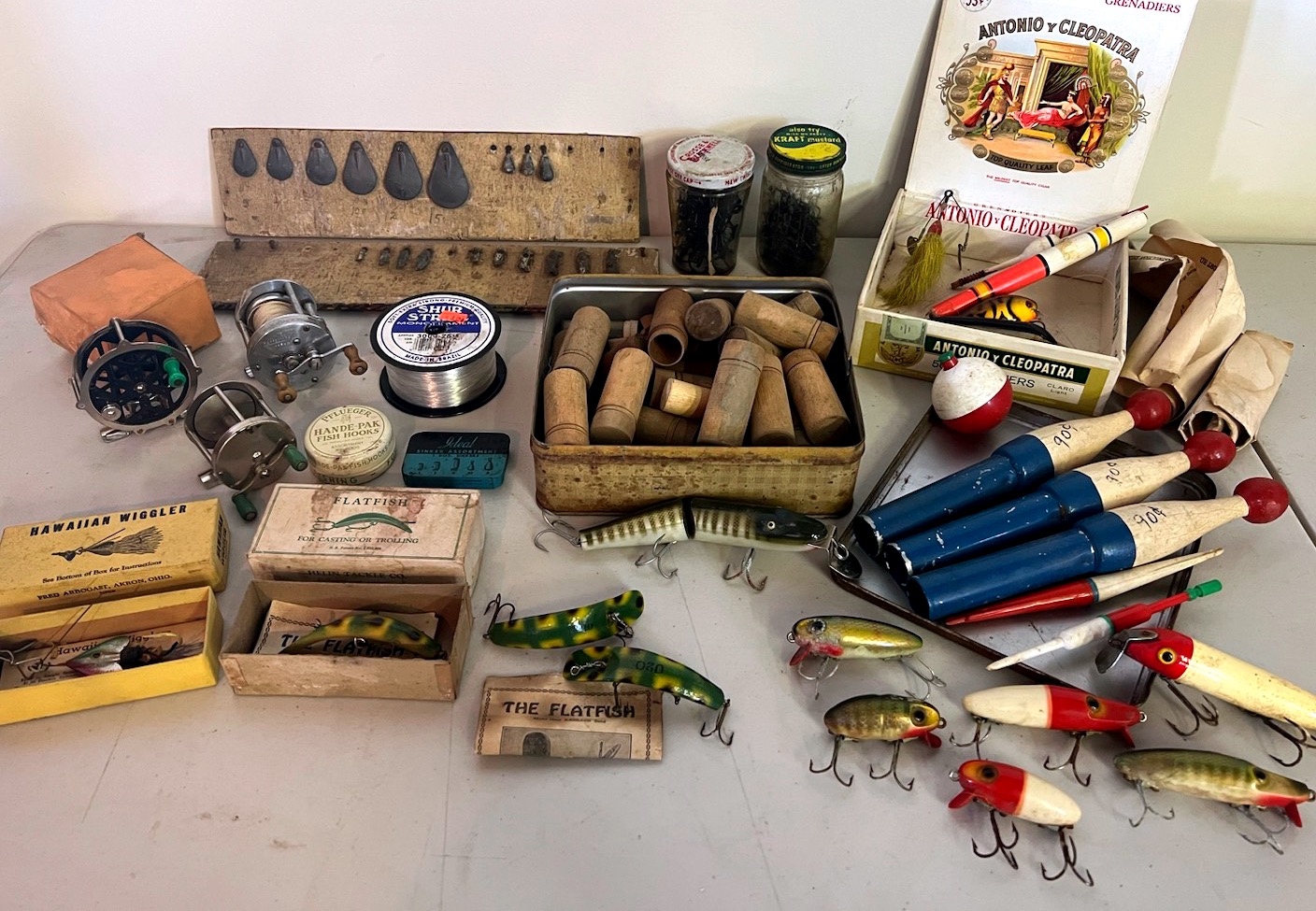 Vintage-Fishing-Gear-With-Reels-Bobbers-Sinker-Price-Boards-Wooden