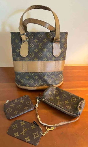 You could win this Louis Vuitton Phenix PM Bag