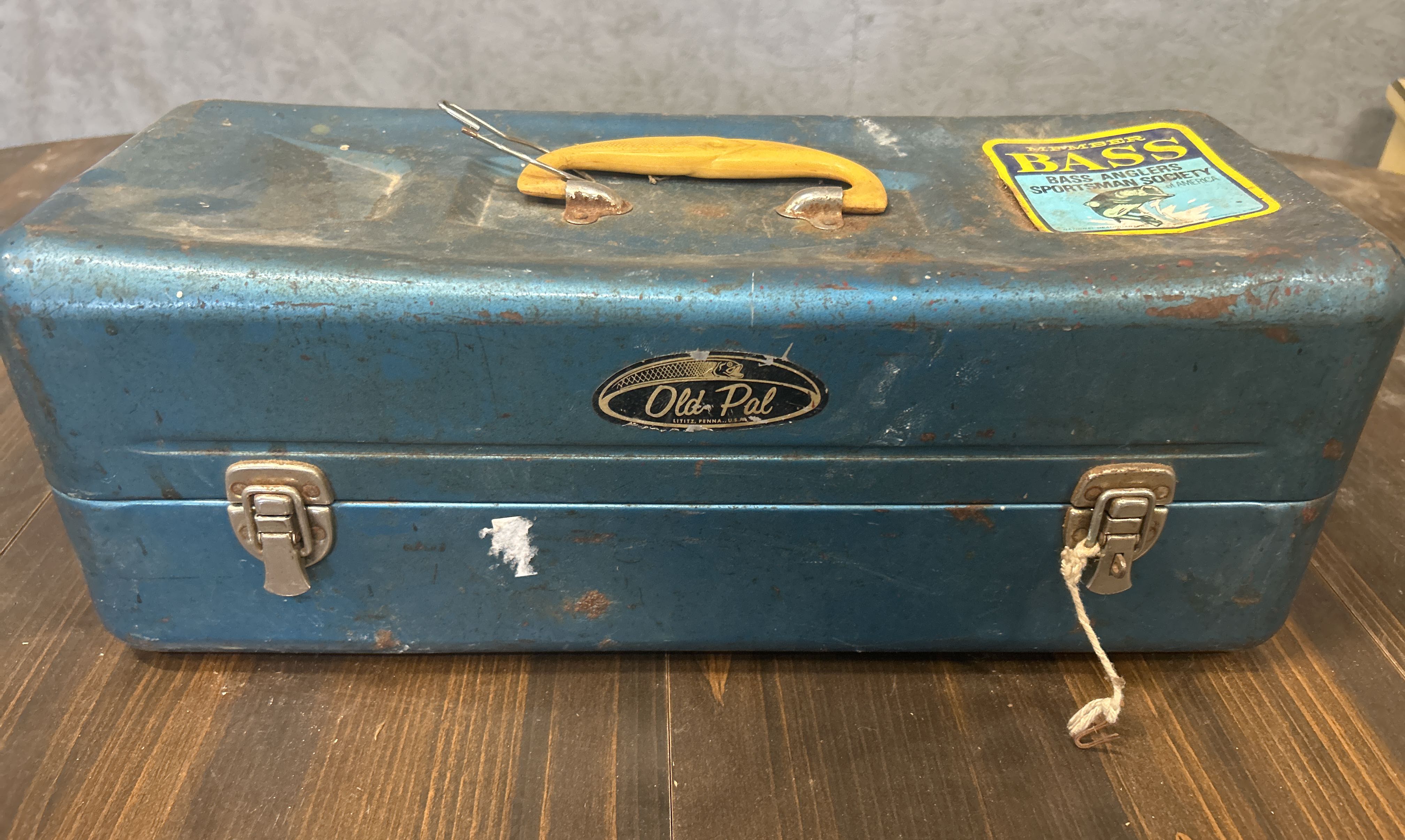Lot - 2 drawer wooden tackle box loaded with lures and fishing supplies. Box  measures 22” x 11” x 6.5”.