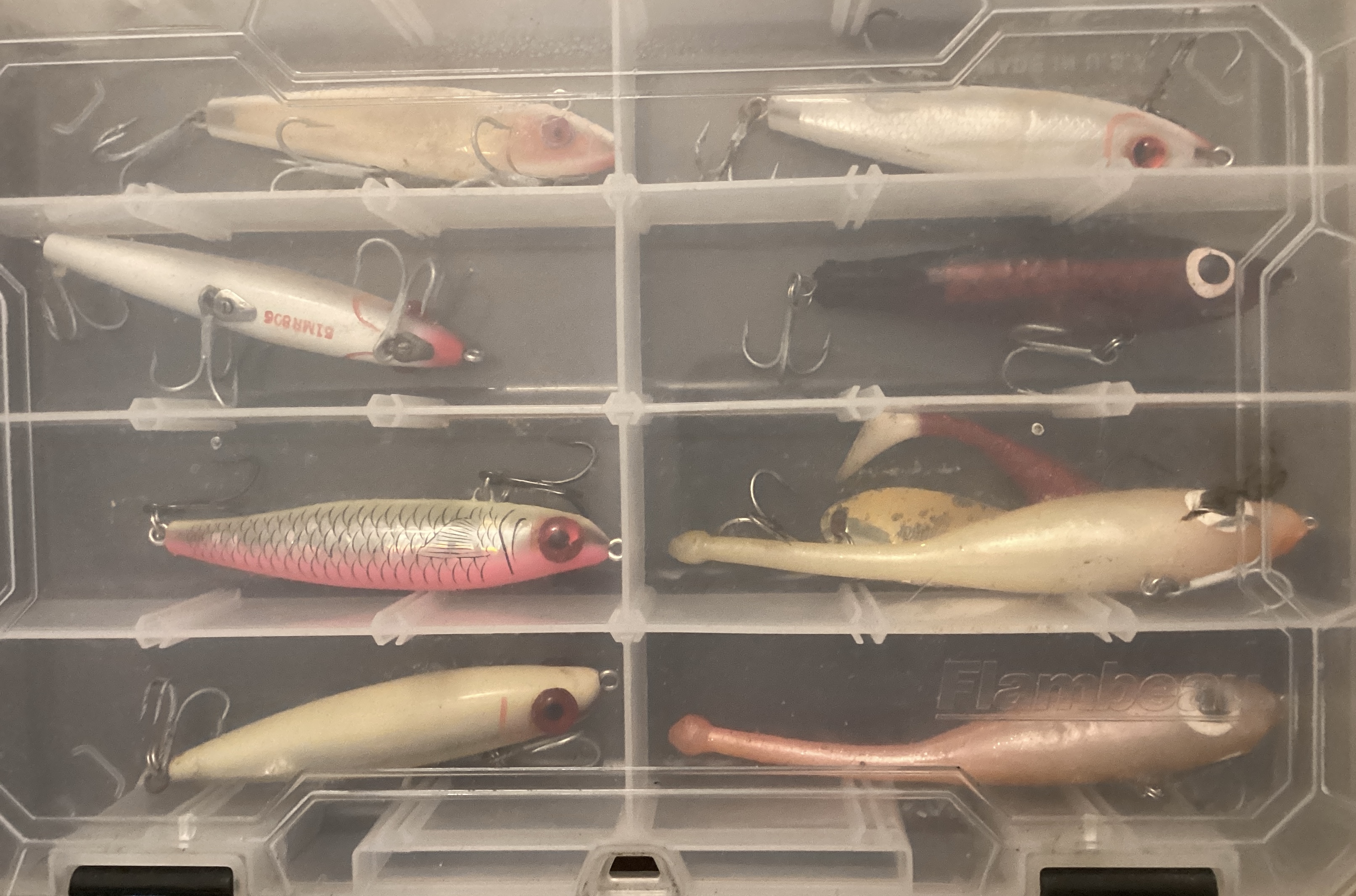 At Auction: Two Ice Fishing Lures in a Slide Top Box
