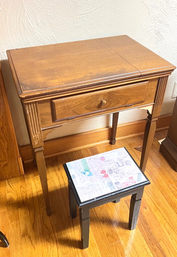 Photo of item: Vintage “Singer” Sewing Machine Cabinet and Chair