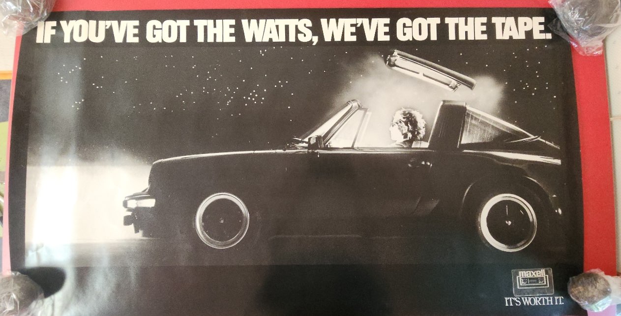 Advertisement-Poster-for-Maxell-Cassette-Tapes-Featuring-a-Porsche