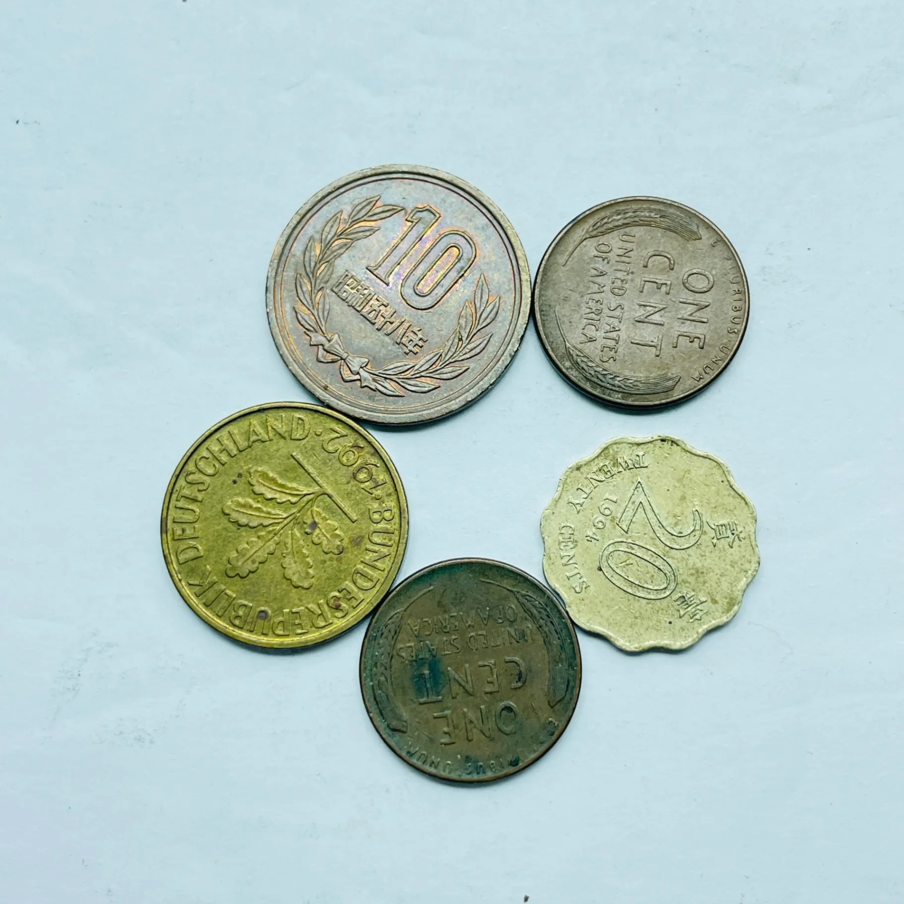 collection-of-five-coins-including-a-Japanese-10-yen-coin